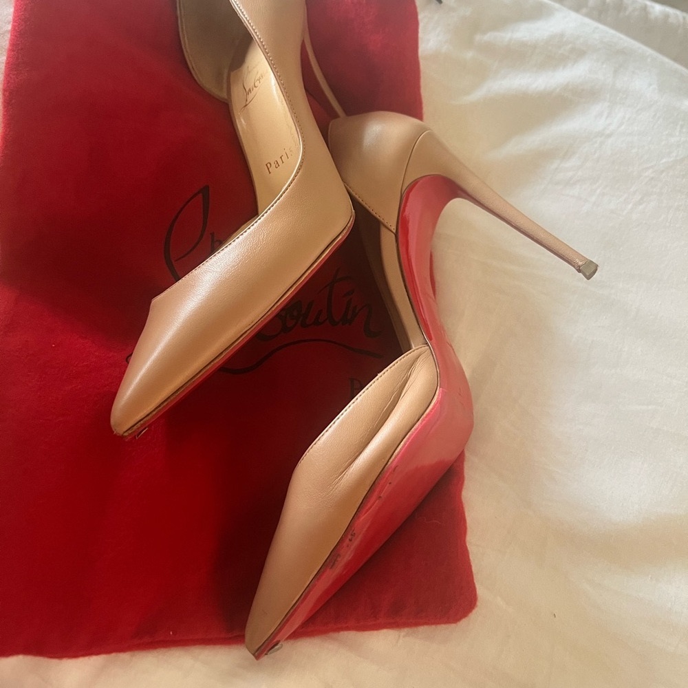 Christian Louboutin Iriza Nude Pumps size 39- heel tap has slight blemish.